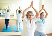 elderly woman doing yoga